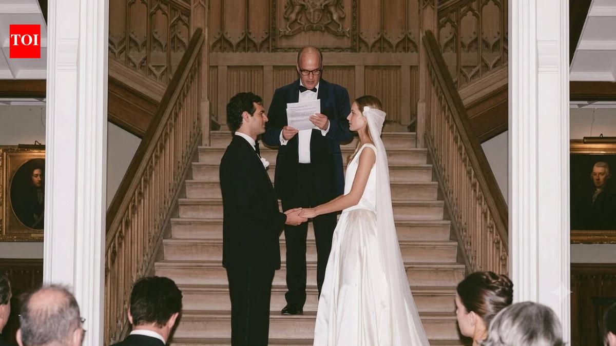 Australian model Serena Wardell married Casper Ettelson at her ancestral Crom Castle in Ireland, carrying silk flowers m